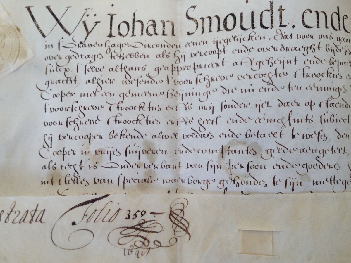 handgeschreven akte met sierlijke beginletters